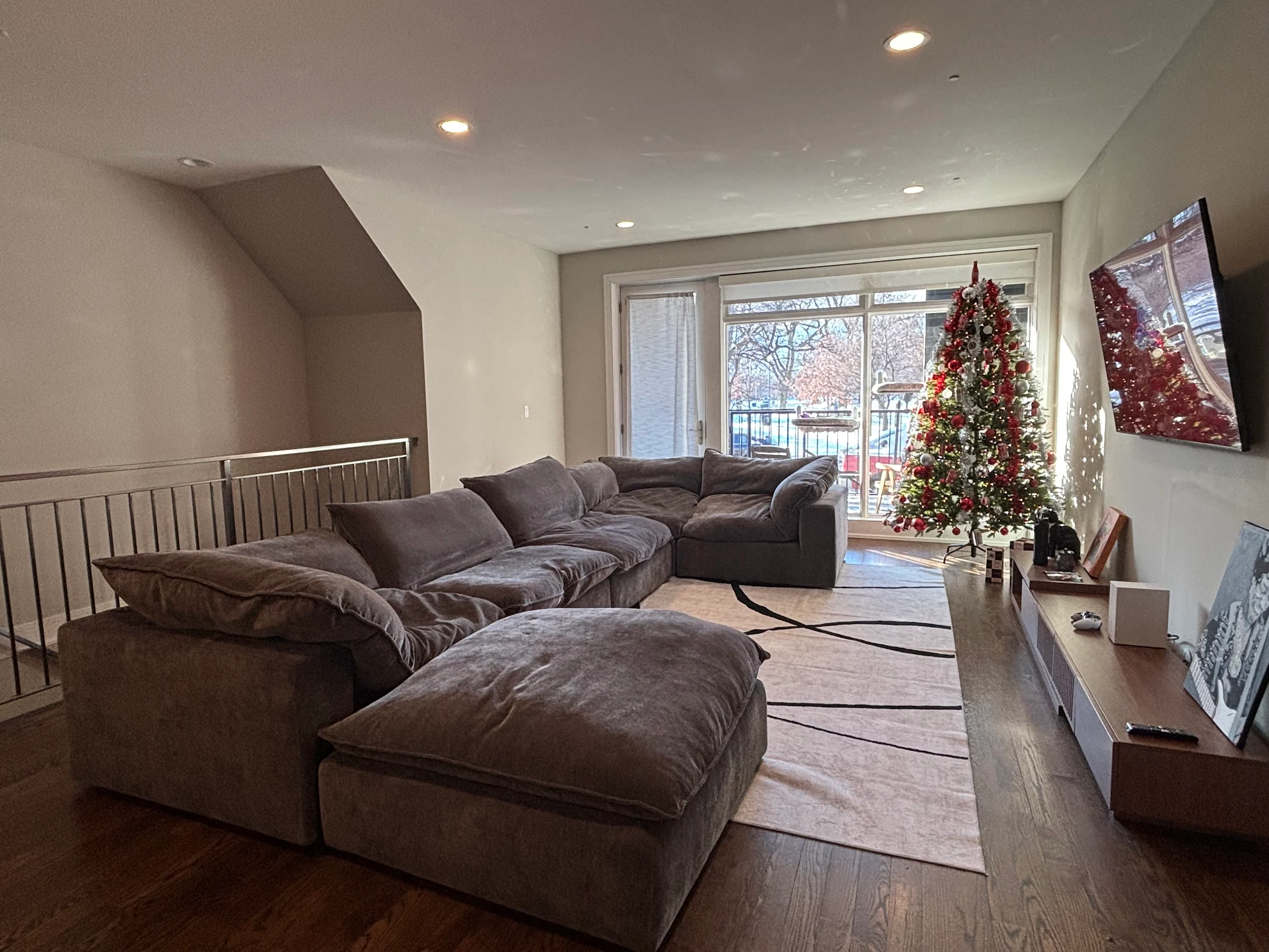 Dark gray cloud couch in customer's home