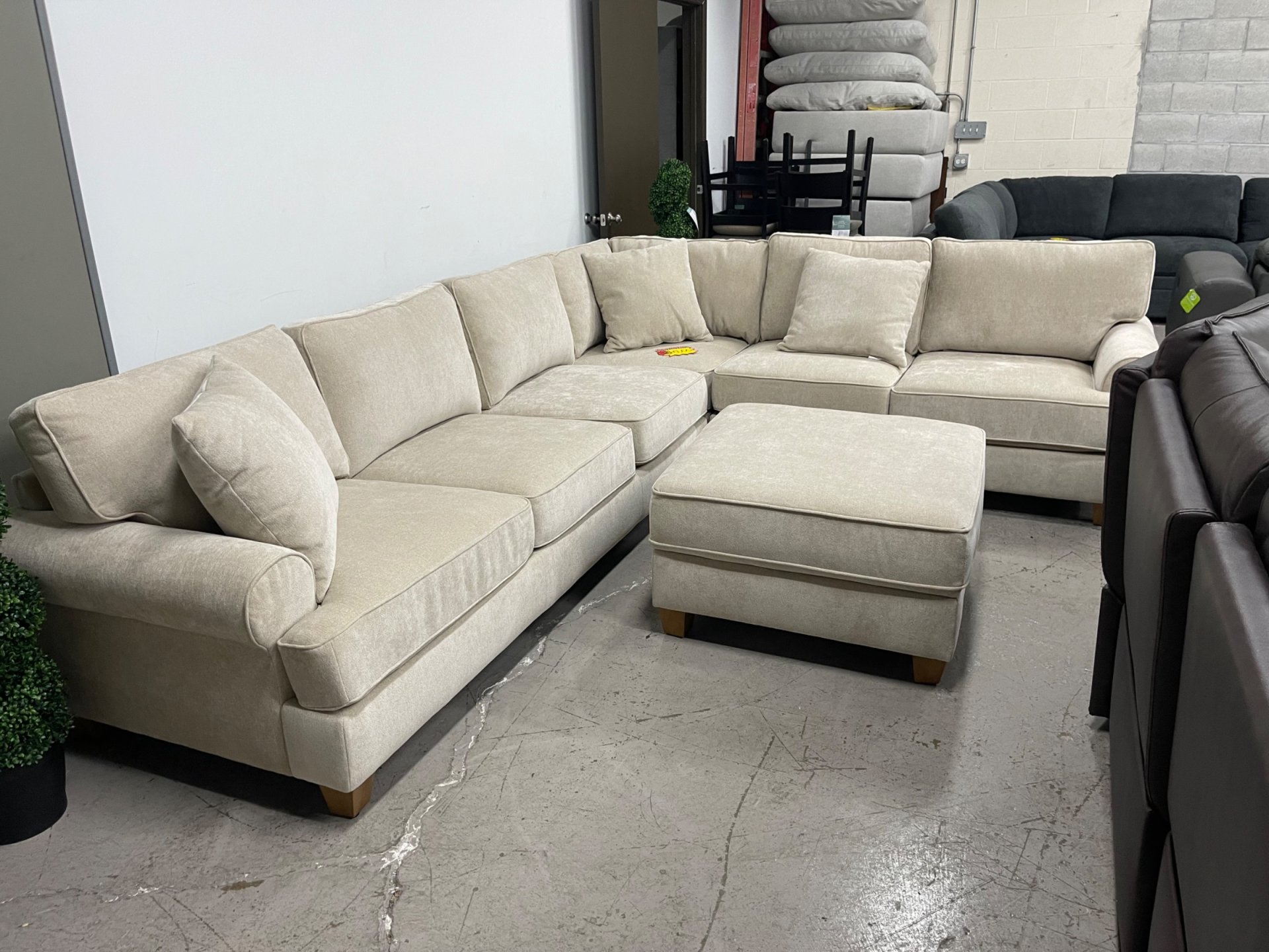 Hazel Fabric Sectional with Storage Ottoman